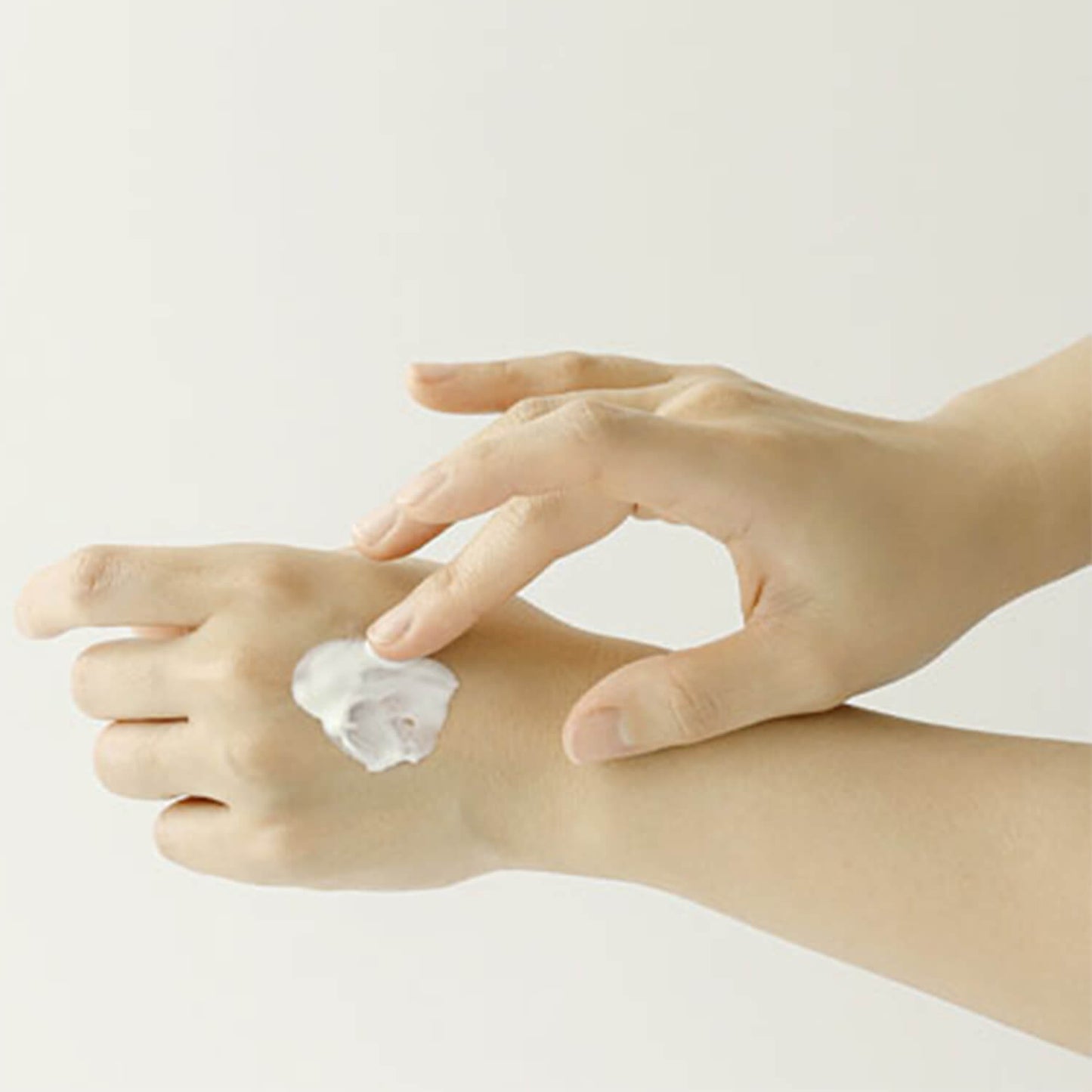 image showing Pakistani girl hands after using Beauty of Joseon Relief Sun Rice + Probiotics available at Heygirl.pk for delivery in Pakistan.