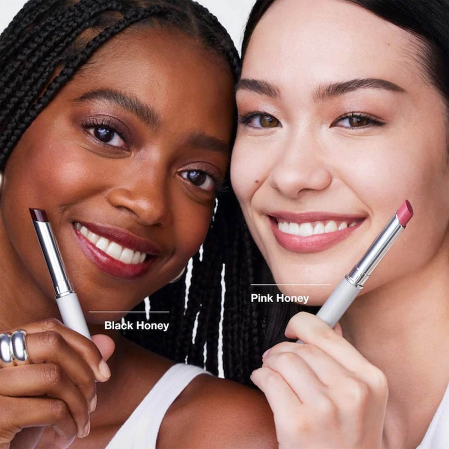 image showing happy girls using Clinique limited edition lipstick in pink honey shade for her available at Heygirl.pk for delivery in Pakistan