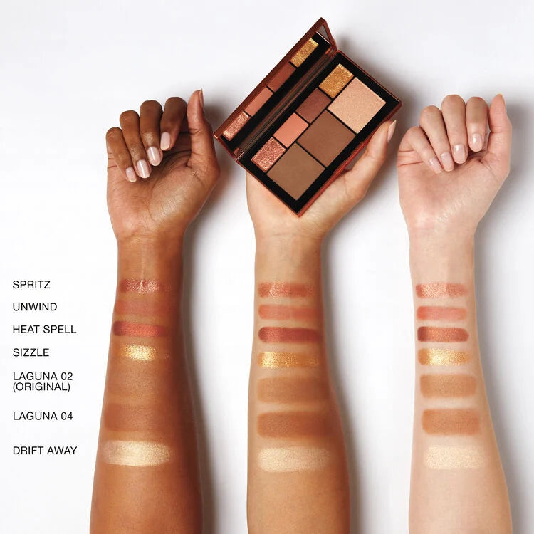 Makeup palette with swatches on three different skin tones against a white background