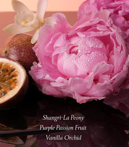 Close-up of a pink peony with passion fruit and vanilla orchid, labeled 'Shangri-La Peony, Purple Passion Fruit, Vanilla Orchid'.