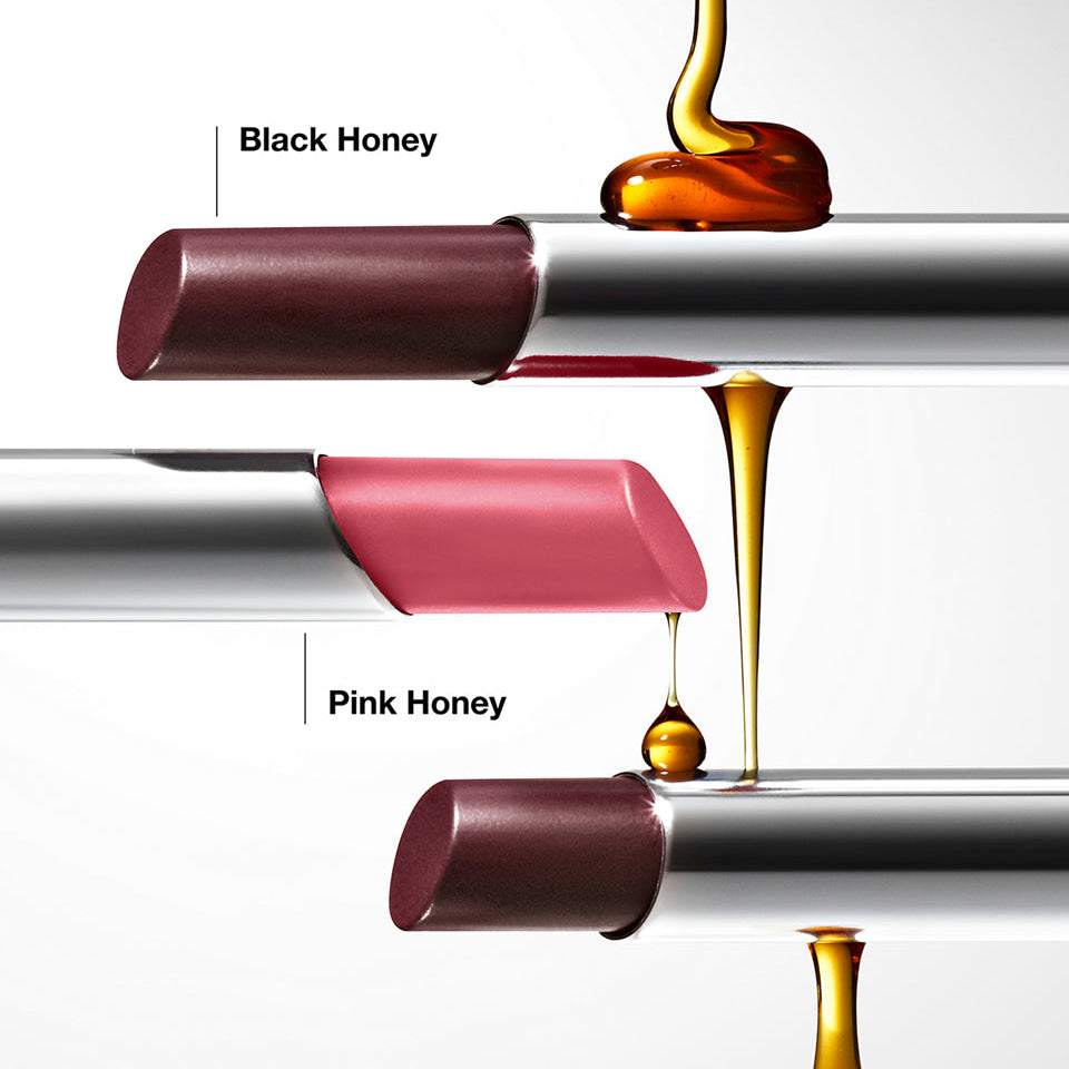 Two lipsticks labeled 'Black Honey' and 'Pink Honey' with honey droplets on a white background.