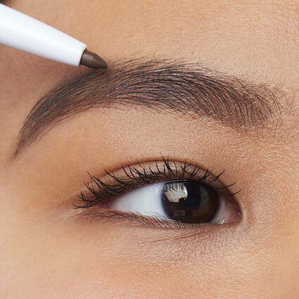 image showing girl using Elf Instant Lift Brow Pencil available at Heygirl.pk for delivery in Pakistan