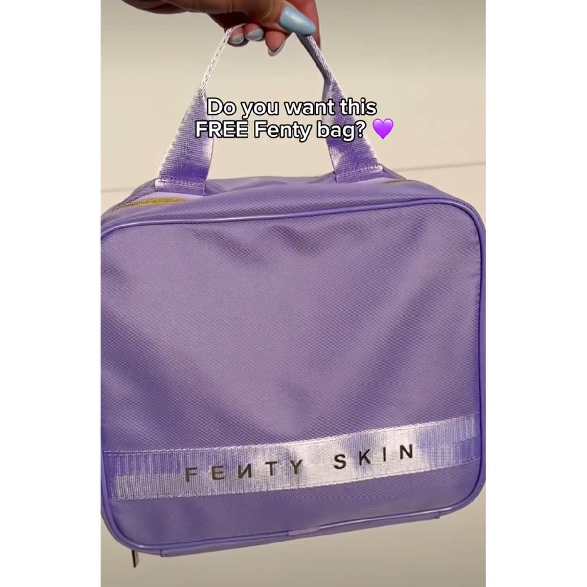 a model holding Fenty Beauty Makeup Bag for HER in Pakistan 