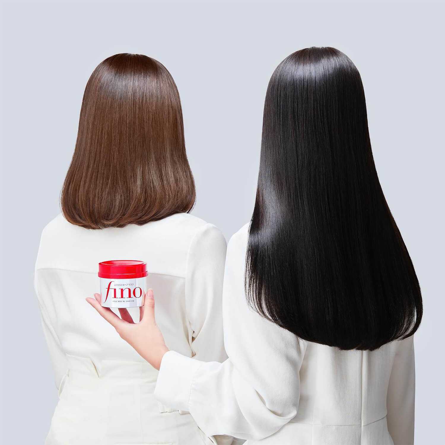 image showing two Pakistani girls with Fino Premium Touch Hair Mask for damaged hair available at Heygirl.pk for delivery in Pakistan.