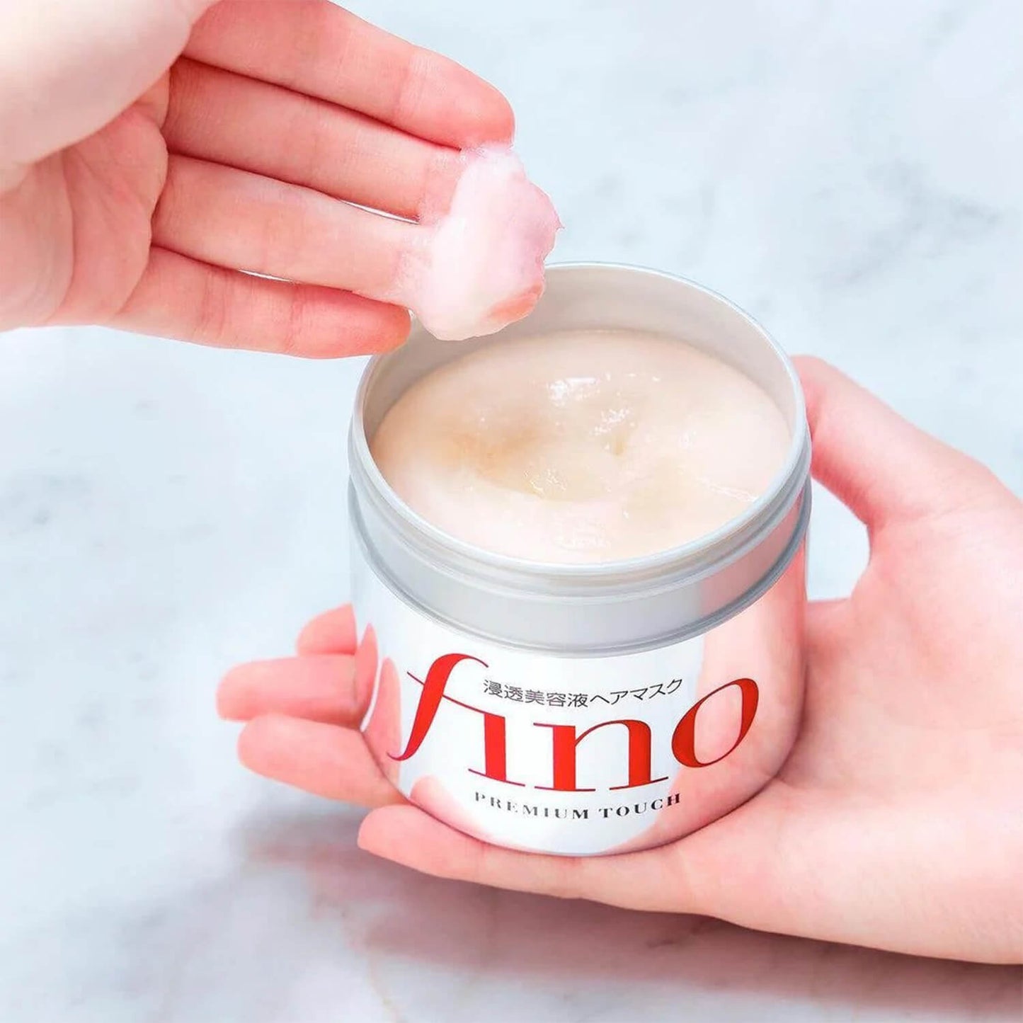 image showing use of Fino Premium Touch Hair Mask for damaged hair available at Heygirl.pk for delivery in Pakistan.
