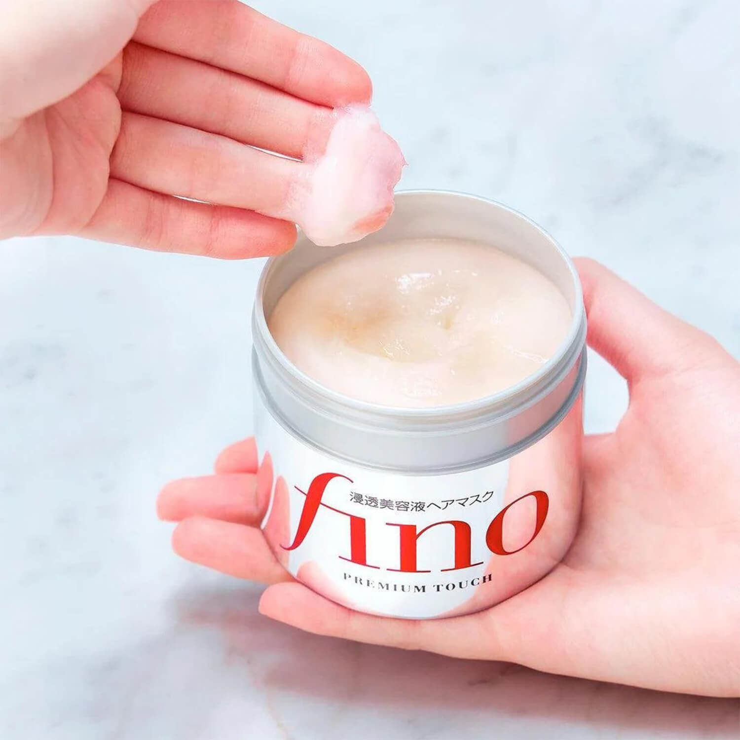 image showing use of Fino Premium Touch Hair Mask for damaged hair available at Heygirl.pk for delivery in Pakistan.