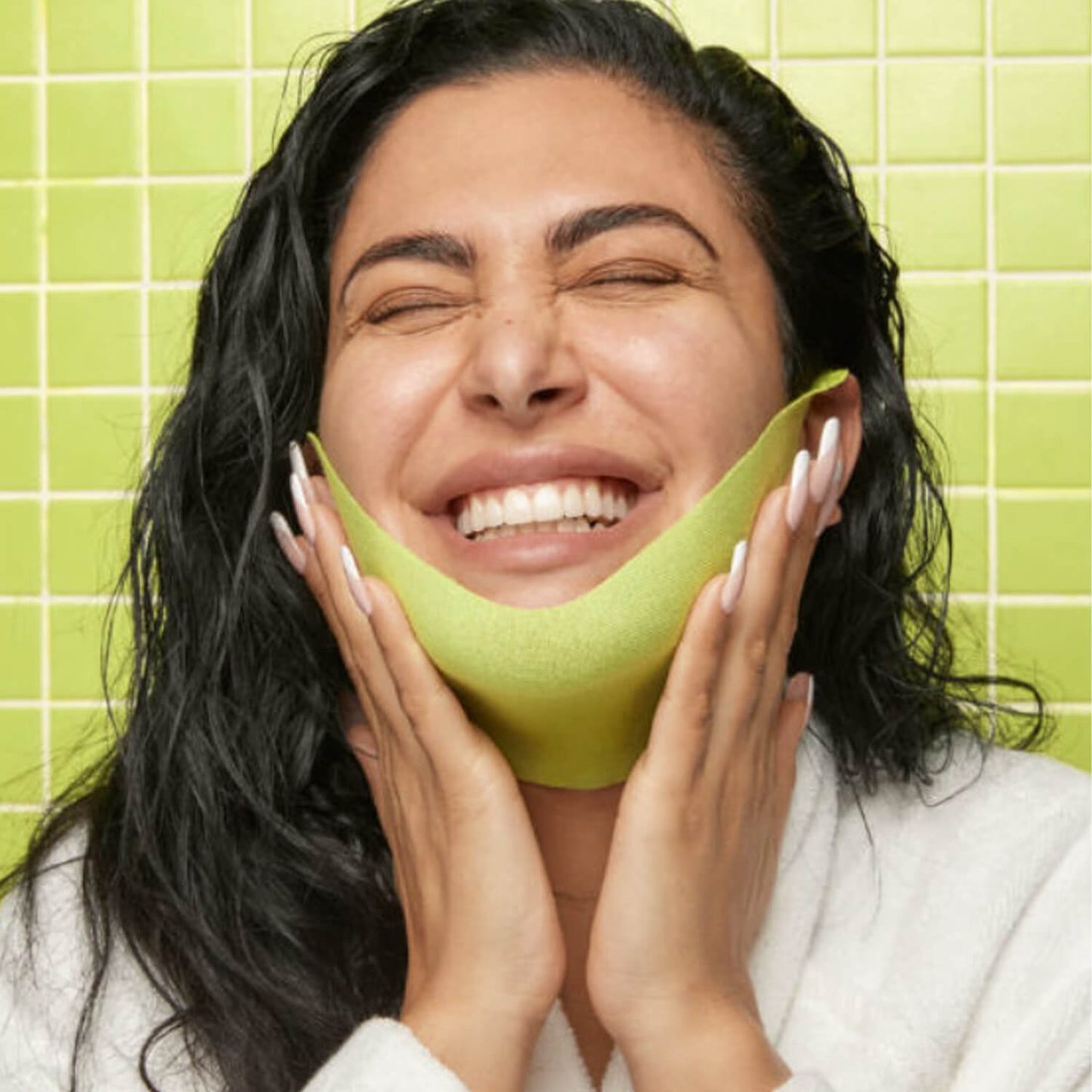 happy huda girl using chin lift mask in Pakistan.