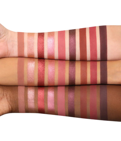 Color swatches of lipsticks in various shades on a white background