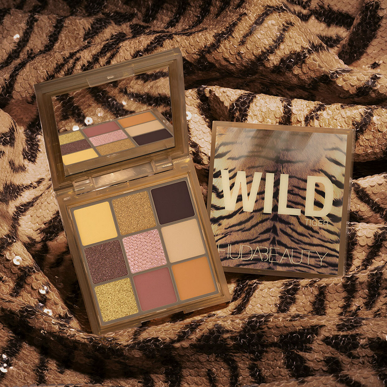 Makeup palette with 'Wild' and 'Juda Beauty' branding on a tiger print background
