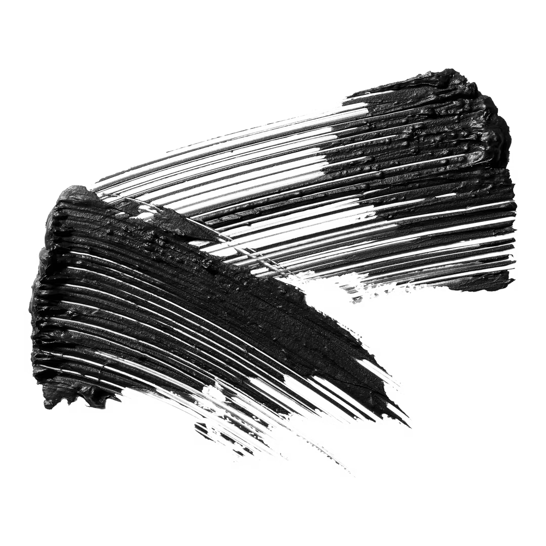 Black makeup brush strokes on a white background
