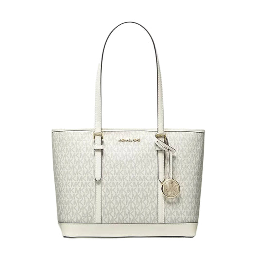100% original Michael Kors tote bag in off-white monogram canvas with cream leather trim, dual top handles, gold-tone hardware, and a hanging MK charm available at Heygirl.pk in Pakistan