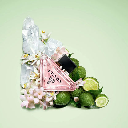 Prada perfume bottle surrounded by flowers and limes available at Heygirl.pk for delivery in Pakistan
