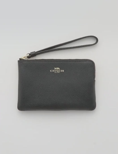 Shop coach wristlet for her available at Heygirl.pk for delivery in Pakistan