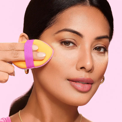 beautiful girl using Real Techniques makeup puff gift set for her available at Heygirl.pk for cash on delivery in Pakistan.