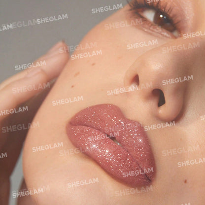 Close-up of a person's lips with glittery pink lipstick of brand SHEGLAM available at Heygirl.pk in Pakistan