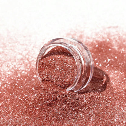 Rose gold glitter with a clear jar on a white background
