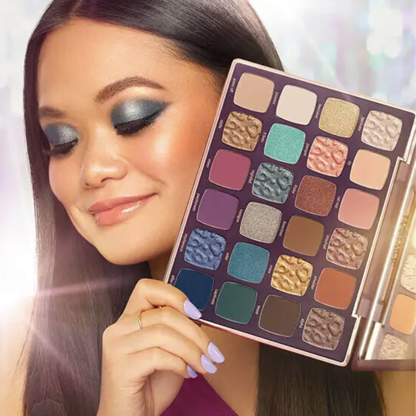 Woman holding tarte eyeshadow palette available at Heygirl.pk for delivery in Pakistan