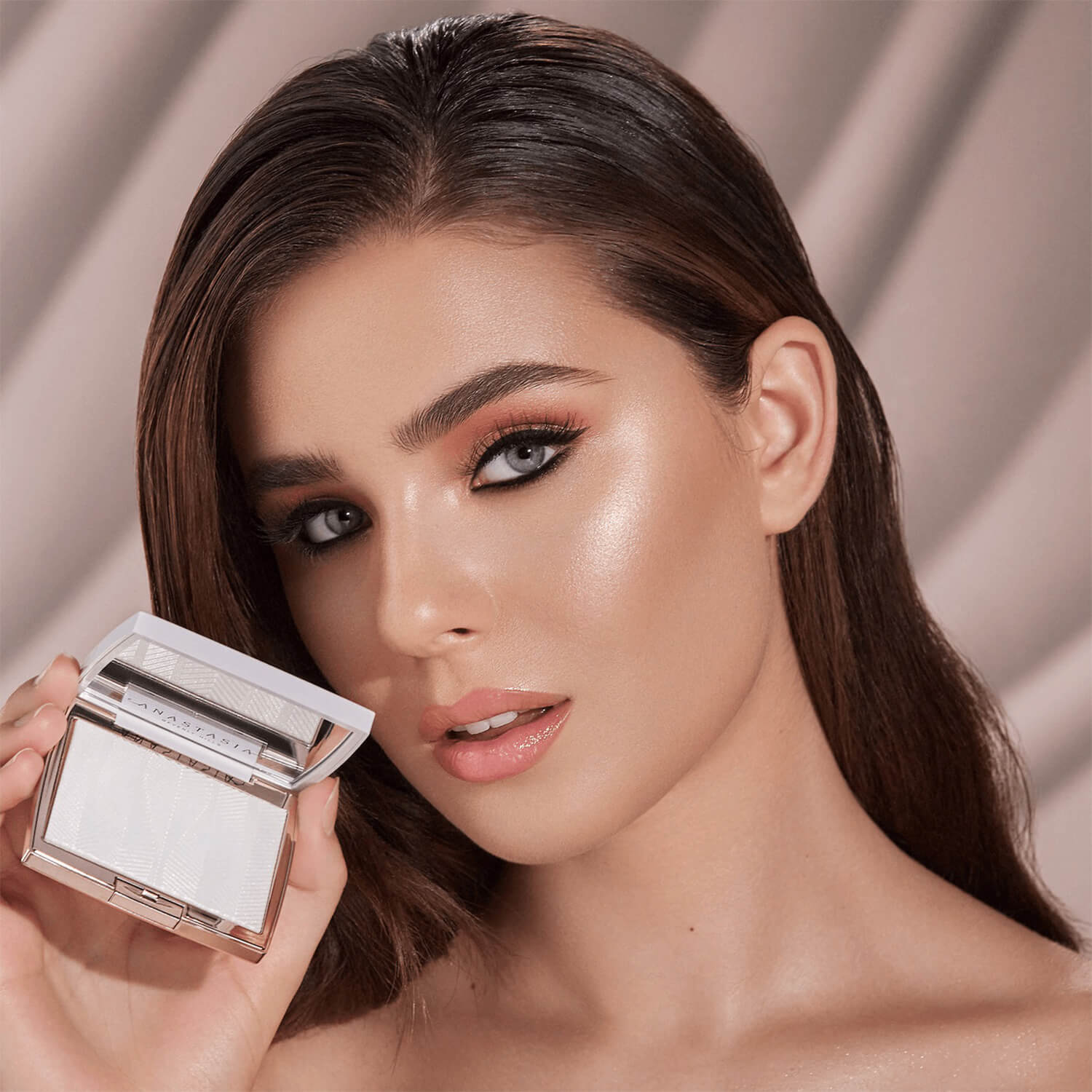 beautiful girl showing anastasia iced out highlighter available at Heygirl.pk for delivery in Pakistan